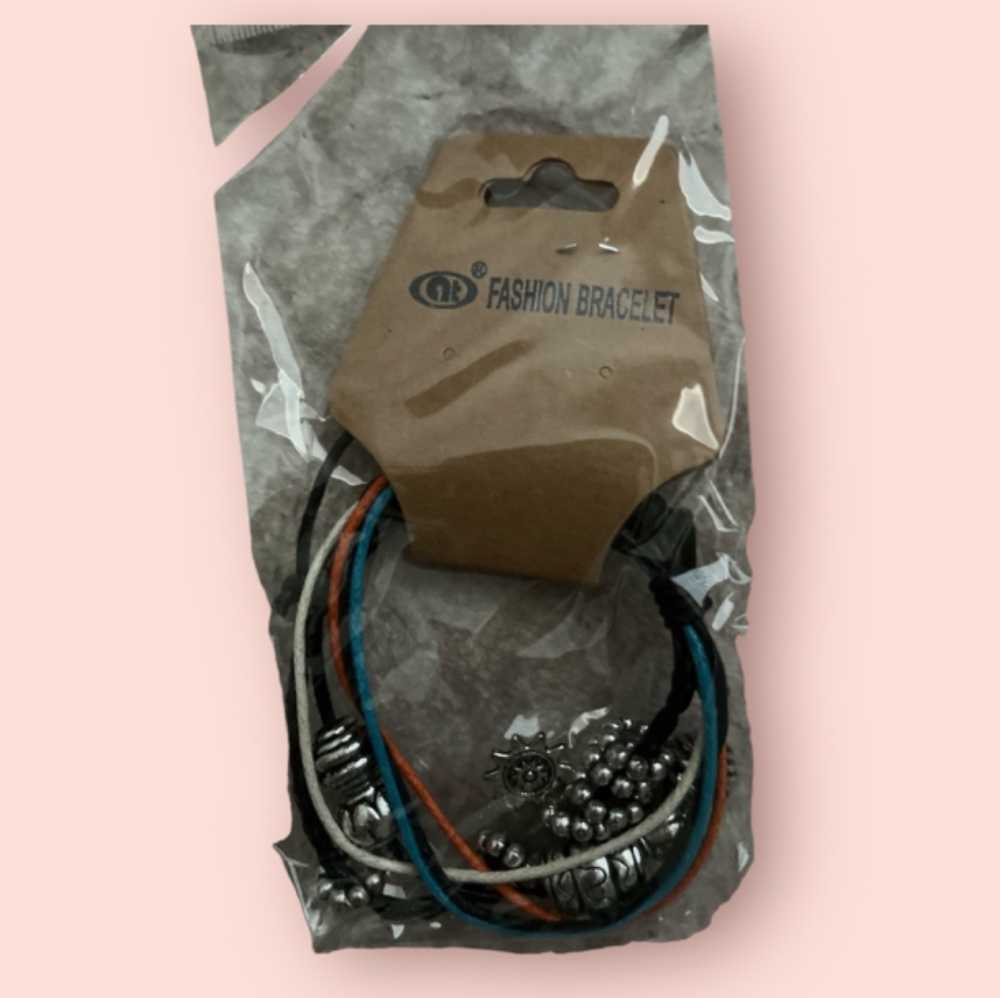 🥳 7/$10 CLEARANCE PRICE❣️ Set of Bracelets in Black, Blue, Red and Pink